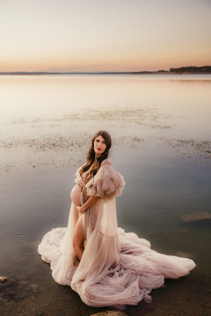 Stunning portrait of pregnant mom in a tulle robe. 