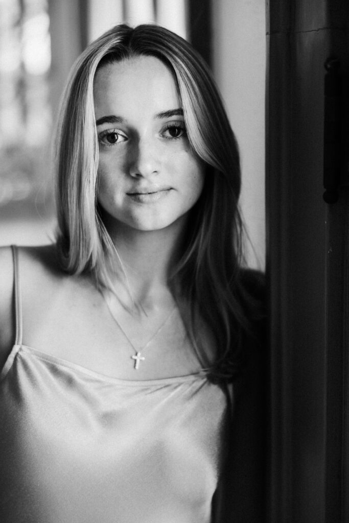 close up of girl in black and white