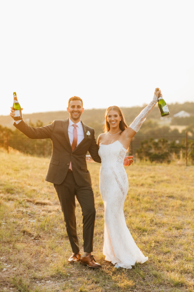 bride and groom with champagne
